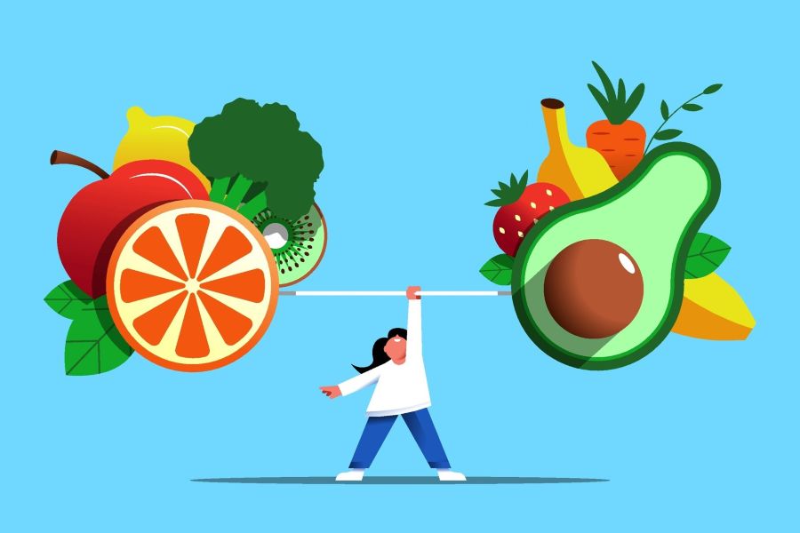 Woman lifting barbell with fruits